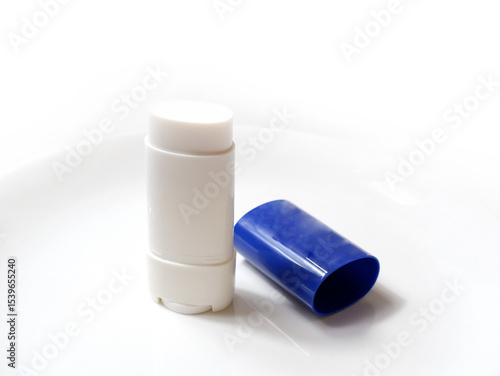 Sun stick on white background, sunscreen
