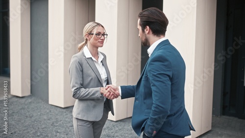 Bilde på lerret Male and female business partners having meeting outdoor