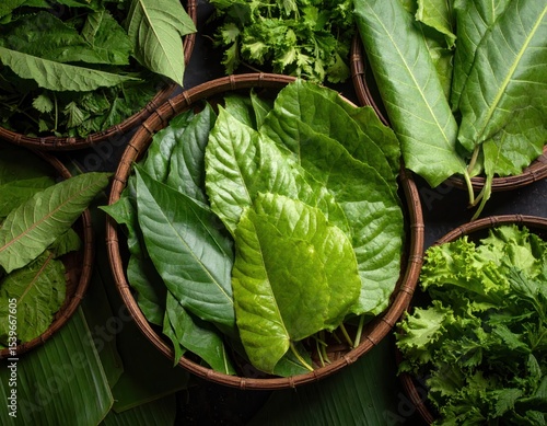 Assorted vibrant green leafy vegetables in woven baskets