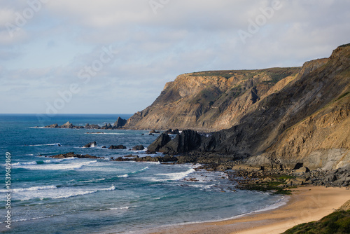 Stunning coastline inspiring surfing in praia da ponta ruiva, al