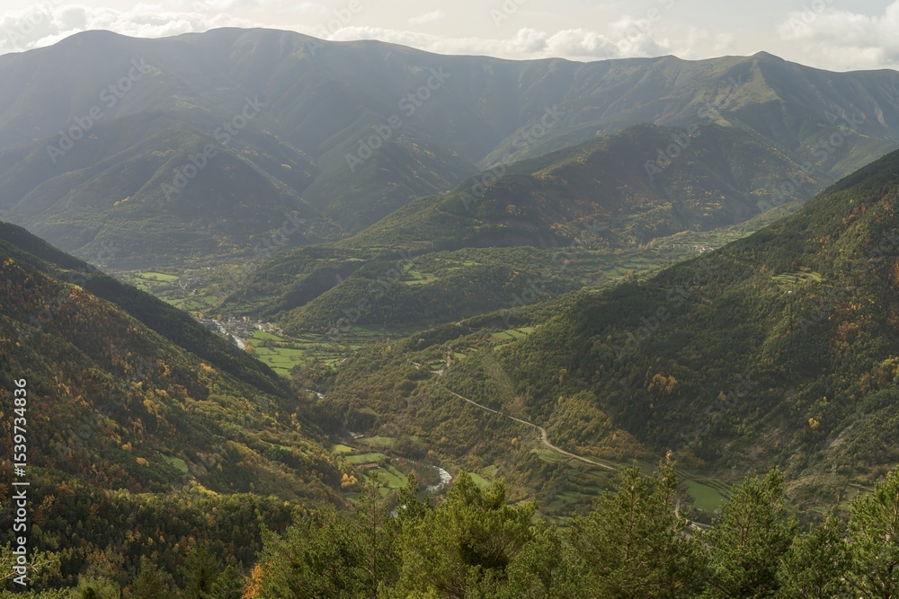Fototapeta premium Picturesque rural village of Brotos, nestled in a green valley of Ordesa - Huesca.