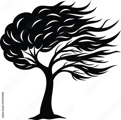 Dramatic Black and White Image of a Tree Bending in the Wind
