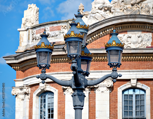 Fototapeta Naklejka Na Ścianę i Meble -   Historic five-armed street lamp on the Place du Capitole in Toulouse, France