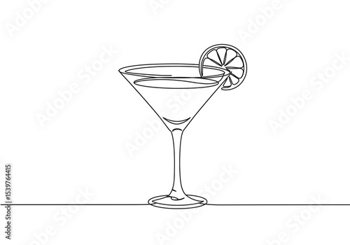 Continuous line drawing of a martini glass with a lemon slice on white background art design