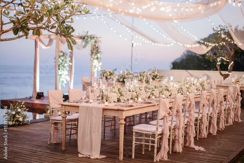lovely Table setting for magnificent composition from flowers at a wedding , Centerpiece white and orange color palette flower bouquet arrangement