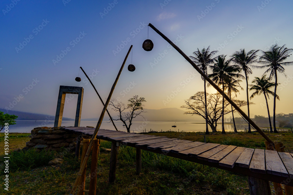 Fototapeta premium sunset over the peaceful lake