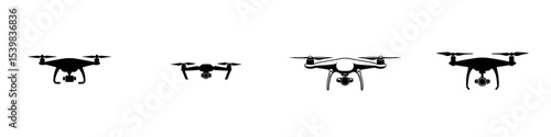 Silhouette of four different drones in various sizes showcasing advancements in aerial technology during daytime