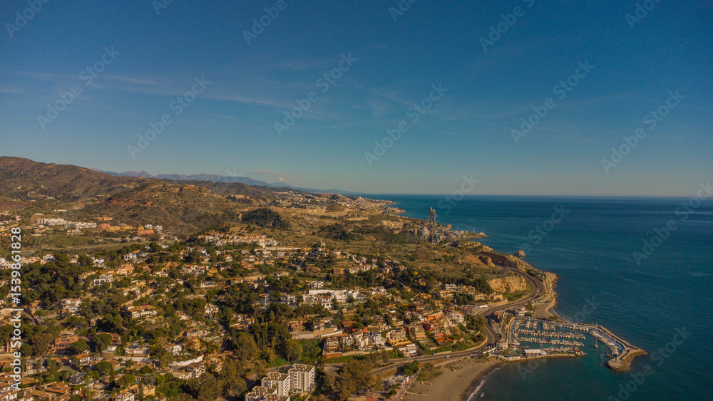 Fototapeta premium Drone Image of Calm Waters and Historic Seaside Homes in Pedregalejo Beach