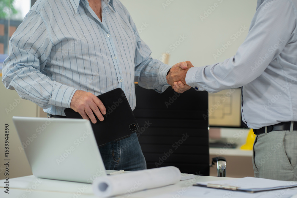 Successful architects, excited engineering team in office. Successful architects, excited engineering team in office.