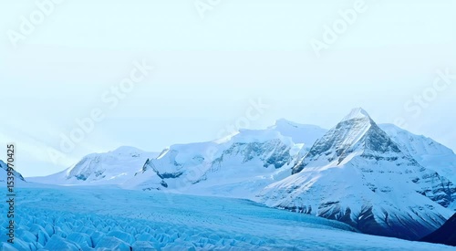 Snowy mountain range over a glacier