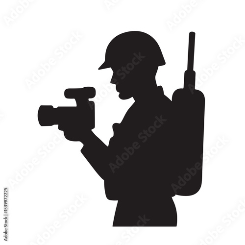 Combat photographer silhouette holding camera and wearing helmet  