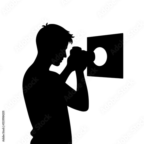 Silhouette of a male photographer taking a portrait shot on Photographer's Day  