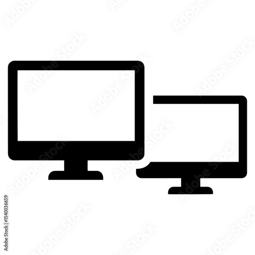 Two computer monitors one larger behind a slightly smaller one both with blank white screens