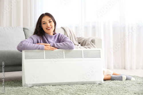 Young woman relaxing at hom...
