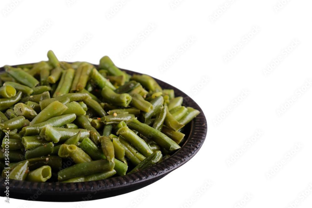 Frying green beans with spices on white background. Copy space Frying green beans with spices on white background. Copy space