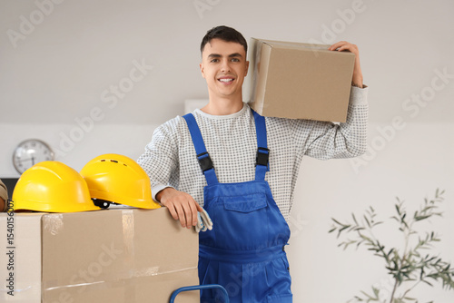 Male loader with cardboard ...