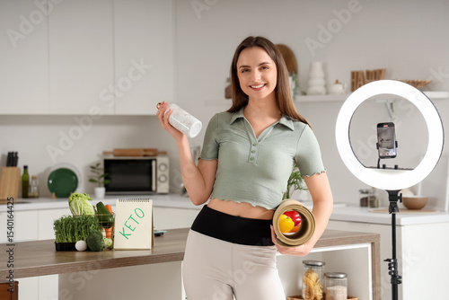 Female blogger with water b...