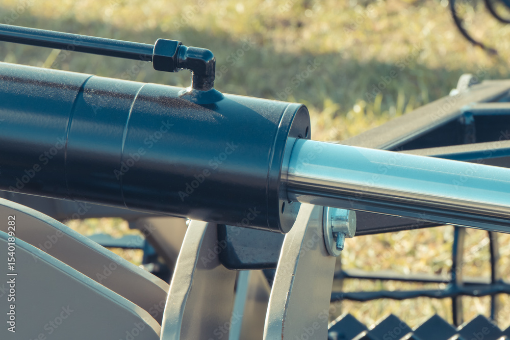 Black pistons or actuators in gray pneumatic or hydraulic machine. Technology Black pistons or actuators in gray pneumatic or hydraulic machine. Technology