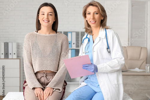 Female doctor with clipboar...