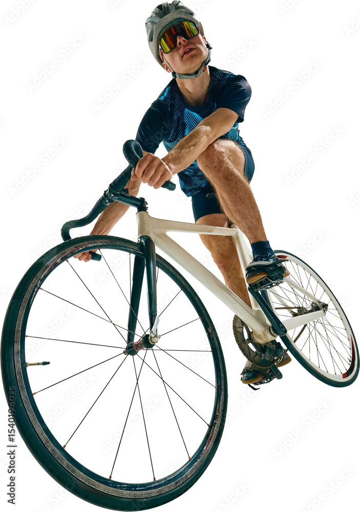 Fototapeta premium Male cyclist leans forward in sprint posture while turning handlebars sharply on racing bike isolated on transparent background. Concept of sport, racing, performance, training, health.