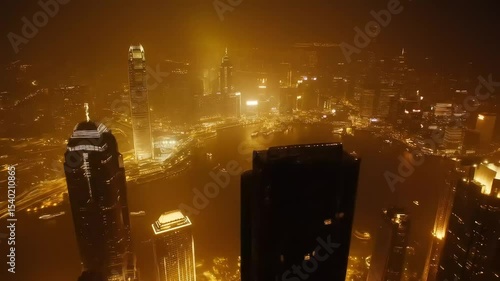 Night cityscape shrouded in orange fog from above