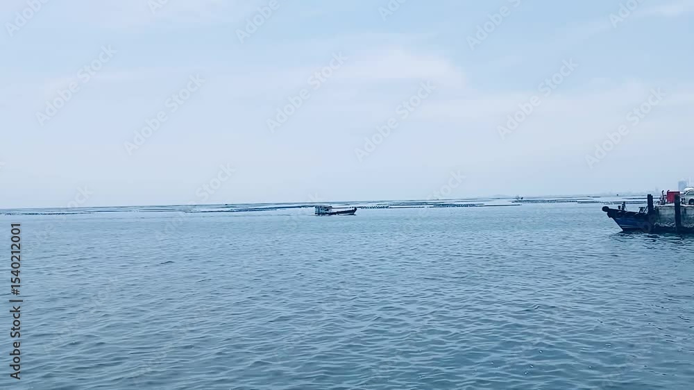 Calm Sea View with Distant Boat on Horizon. Calm Sea View with Distant Boat on Horizon.