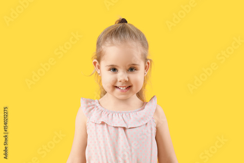Cute little girl smiling on...