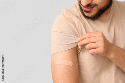 Young man with applied medi...