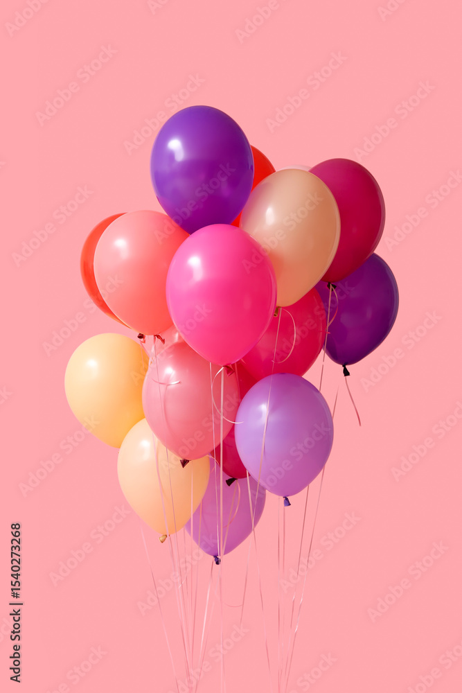 Colorful air balloons on pink background Colorful air balloons on pink background