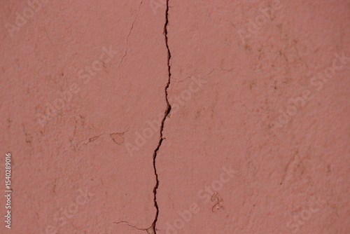 A close-up shot of a cracked wall