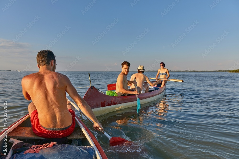 Obraz premium Canoeing on a river, girl in the boat