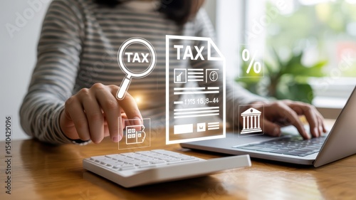 Person interacting with a digital tax document on a computer.