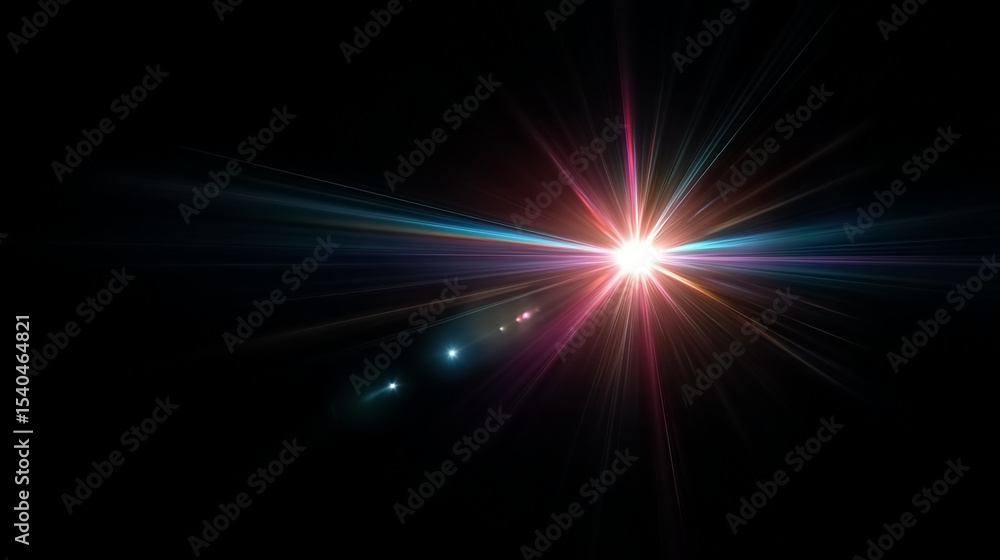 Fototapeta premium A bright starburst light with multicolor rays on a black background, creating a dramatic lens flare effect