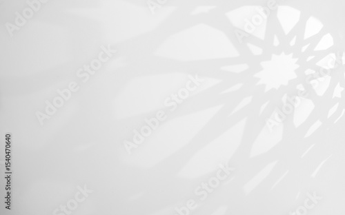 Abstract Arab shadow light wall background with traditional ornament, Islamic design pattern backdrop window light