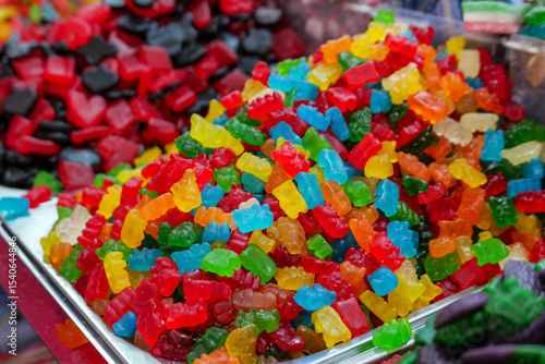 A vibrant pile of colorful gummy bears and candy, highlighting bright artificial dyes which are now under FDA ban. Perfect for themes about food regulation and healthy alternatives.