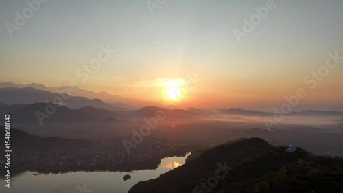 Sunrise Over Pokhara Valley with Mountain Silhouettes and Phewa Lake – Nepal