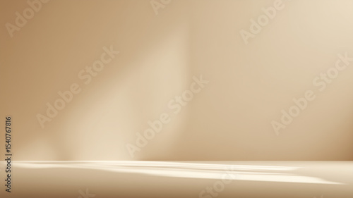 Empty room with beige walls and floor featuring light beams creating shadows