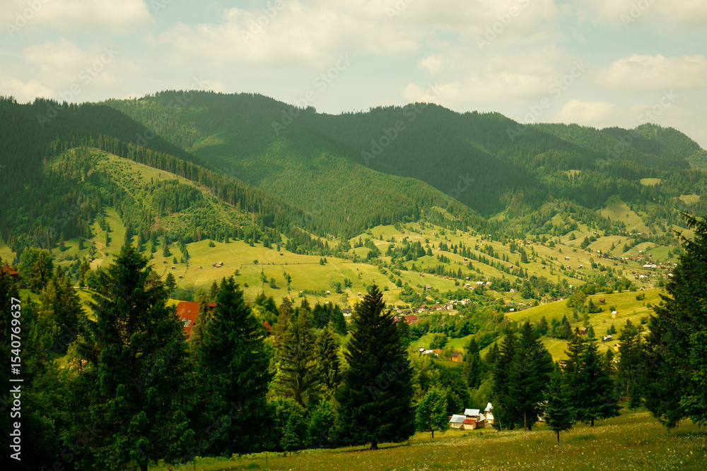 Obraz premium A beautiful village in the mountains in spring.