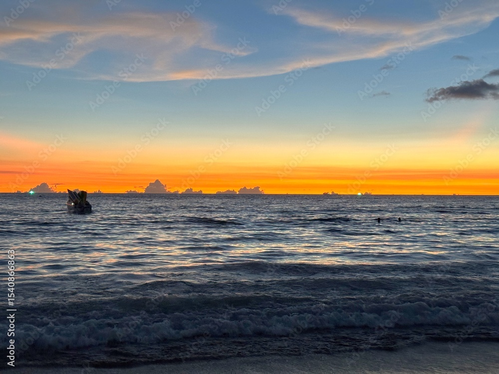 Sunset at Karon Beach with View of the Andaman Sea, Phuket, Thailand Sunset at Karon Beach with View of the Andaman Sea, Phuket, Thailand