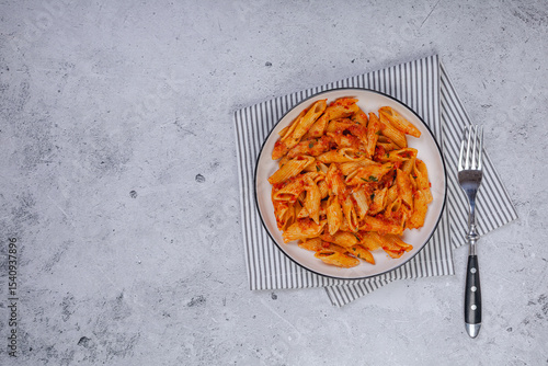 Pasta spaghetti Bolognese with red tomato souse on white plate on isolated white background.