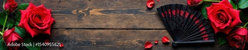 Rustic wood, crimson rose, black lace fan Flamenco festival , background, vintage