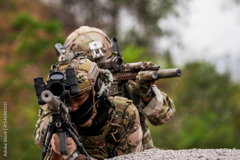 Fototapeta premium Special Forces Soldiers Armed and Ready During Tactical Training – Focused Military Men in Camouflage Uniform, Holding Assault Rifles, Outdoor Combat Operation in Desert Terrain