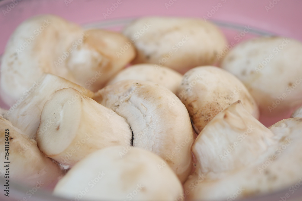 Fresh mushrooms in a bowl ready for cooking Fresh mushrooms in a bowl ready for cooking
