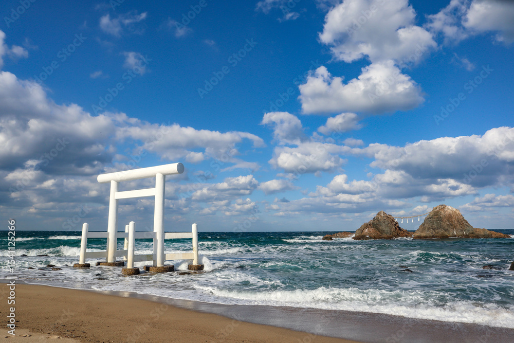White Torii Gate and Meoto Iwa Couple Rocks in Itoshima, Japan White Torii Gate and Meoto Iwa Couple Rocks in Itoshima, Japan