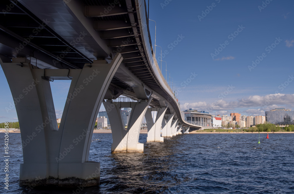 Fototapeta premium yacht bridge St. Petersburg. A concrete bridge with pillars across the bay.
