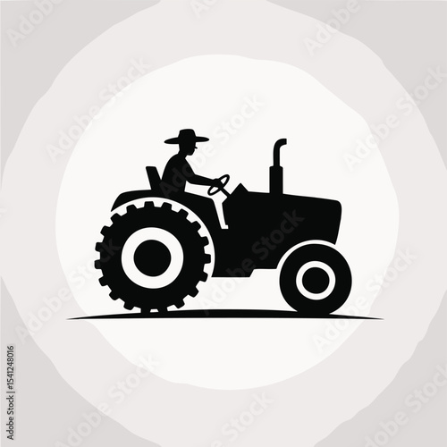 Farmer drives a tractor on his land in silhouette. Agricultural work, farming, rural lifestyle, agriculture industry