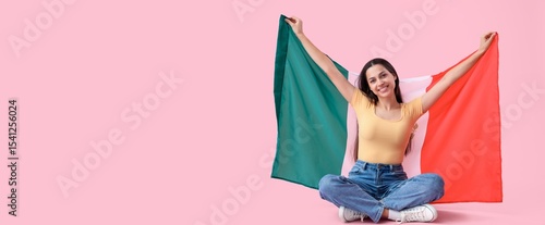 Happy young woman holding M...