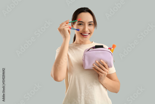 Beautiful young woman with ...