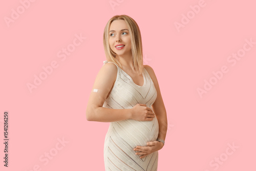 Young pregnant woman after ...