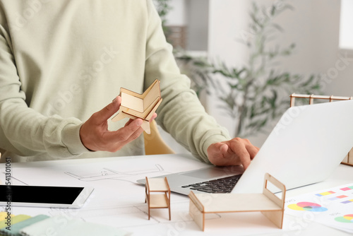 Male furniture designer wit...